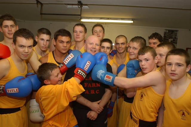 Plains Farm Boxing Club was celebrating after it received new kit for its boxers in 2005. It looks like coach Neil Martin, centre, thought it was a knockout.