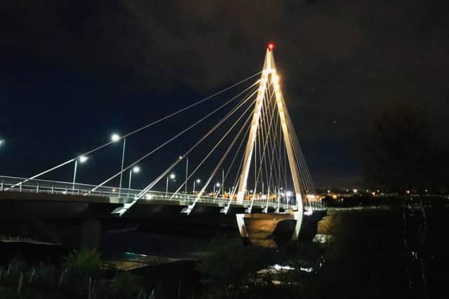 Northern Spire Bridge lit up gold for Autism Acceptance in 2021