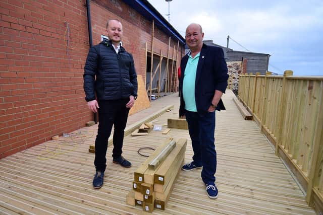Directors Ben Davis and his father Trevor standing on the terrace at the conversion of the old toilet block into a gin bar at Pier View, Roker. Picture by FRANK REID