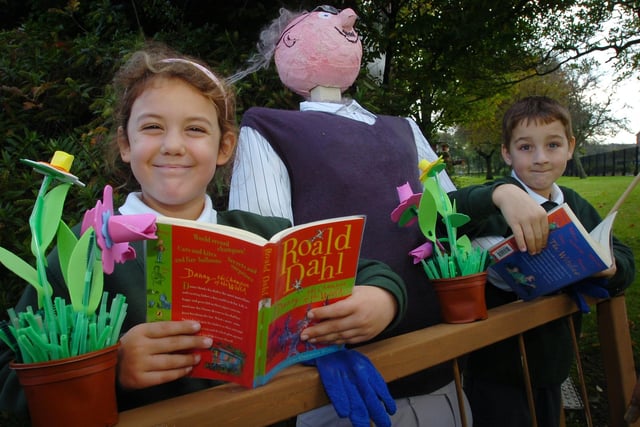 Pupils from Broadway Junior School with the Roald Dahl themed scarecrows they helped to make. Remember this?