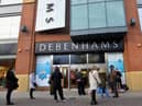 Shoppers wait to get into Sunderland's Debenhams store, which will close on Saturday, May 8.