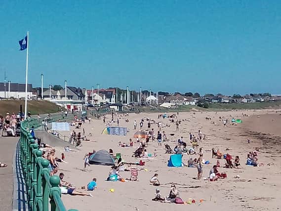 Scenes at Seaburn beach as people enjoy the warm weather (photo: Stu Norton)