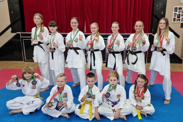 The Dokan squad with their medals from Italy.