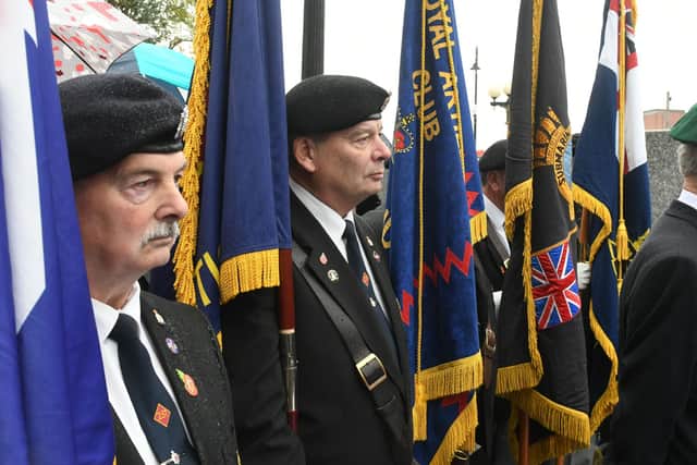 Military standard bearers attended the ceremony.