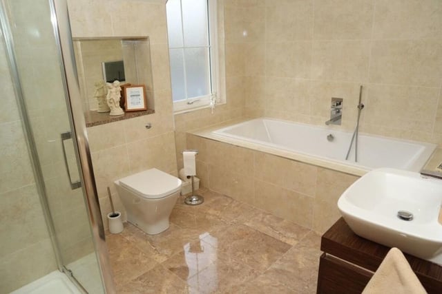 Family bathroom boasts plenty of room for a spacious bath and shower - with lots of natural light flooding in too.