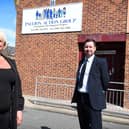 Karen Noble, manager at Pallion Action Group, with Newcastle Building Society's David Pearson.