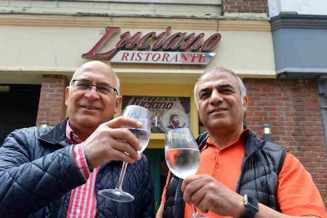 Luciano Ristorante brothers from left Habib and Masud Farahi celebrate 30 year anniversary.