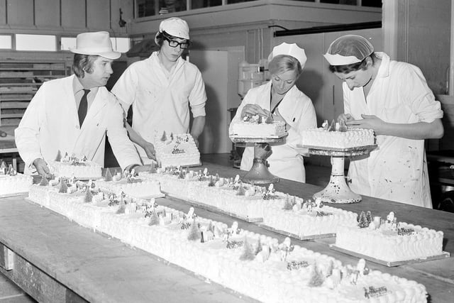 Who's for a slice? Christmas cakes being decorated at Milburns in 1973. And don't they look delicious!