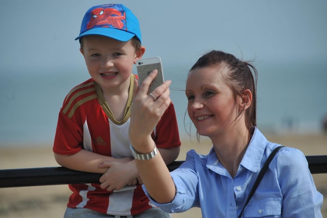 Making the most of the hottest day of the year in 2019 were Claire Coxon and son Jake on Roker Beach.