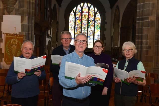 Some of the members of Bishopwearmouth Choral Society rehearsing for the Christmas concert with chairperson Mike Foster, centre.