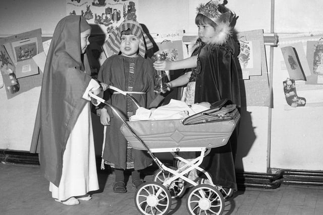 A final rehearsal for Louise Colledge (4), Adam Mearns (3) and Andrew Lillendale (3) at the Roker Methodist Church Playgroup Nativity in 1974.