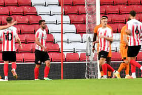 WIll Grigg celebrates his late goal at the Stadium of Light