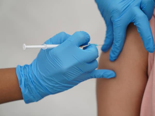 People are being urged to get their Covid and flu vaccinations.
