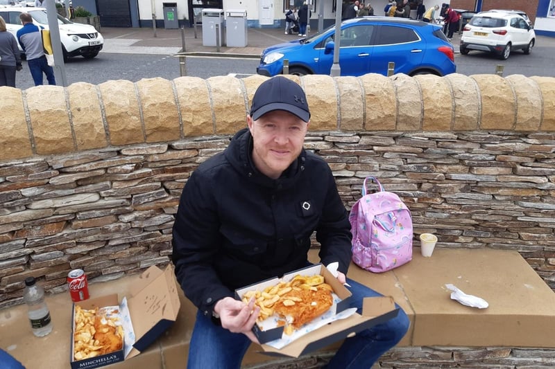 Dave Rogers, 39, tucking into his Good Friday fish and chips.