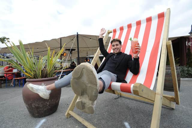 After being closed since November 2020, pubs were finally able to open for outdoor drinks on April 12. Gabriel Blackmore enjoys a drink at The Palm, Sunderland.