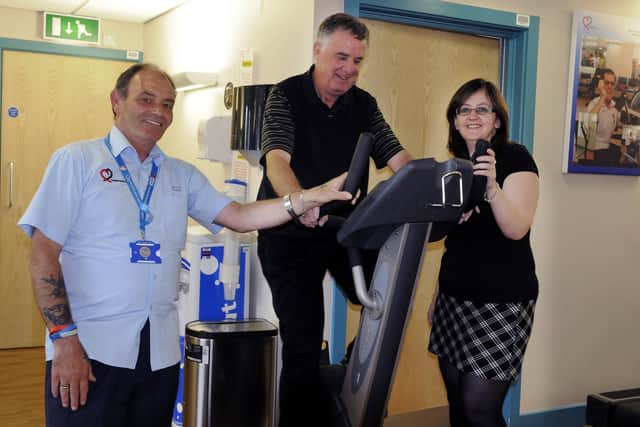 Mick Killeen, left, pictured at work with a client in the gym at Healthworks in Easington Village in 2012, watched by Fiona Maher who was in charge of the centre at the time.