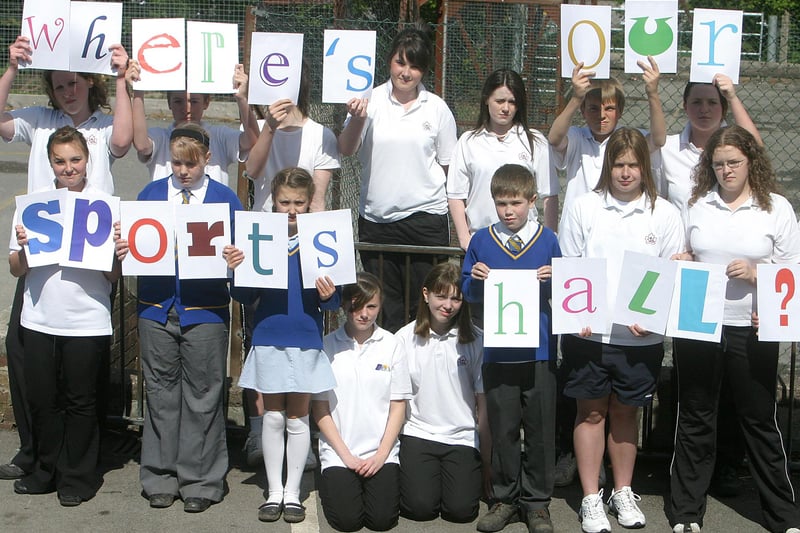Pupils from St Thomas More and St Annes schools protest at the cancellation of their sports hall on the day that building work should have started.