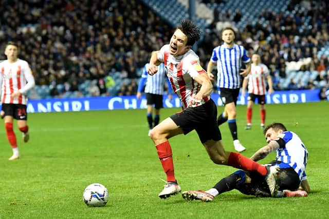 Sunderland midfielder Luke O'Nien is fouled against Sheffield Wednesday.