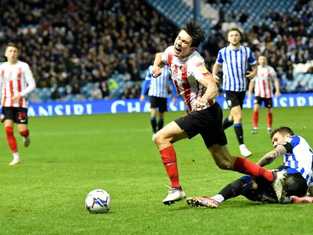 Sunderland midfielder Luke O'Nien is fouled against Sheffield Wednesday.