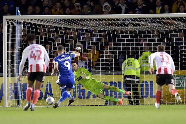 Jonson Clarke-Harris scores his second goal of the night