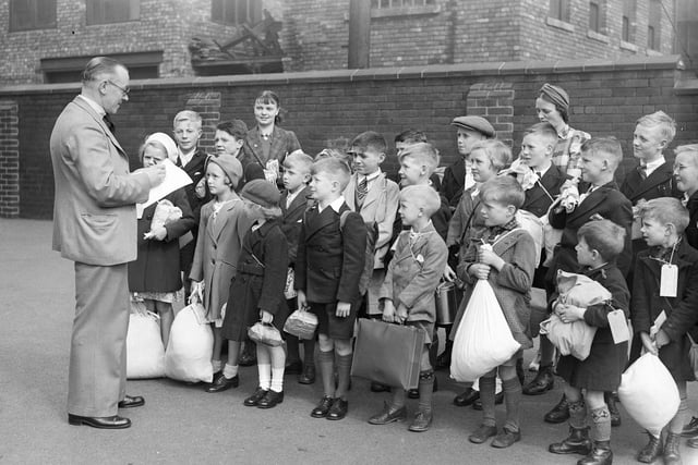 These children lined up in Hudson Road in 1940 before being evacuated. The street's name derives from the MP for Sunderland from 1857 to 1859 and the man who financed the building of Sunderland's South Dock.