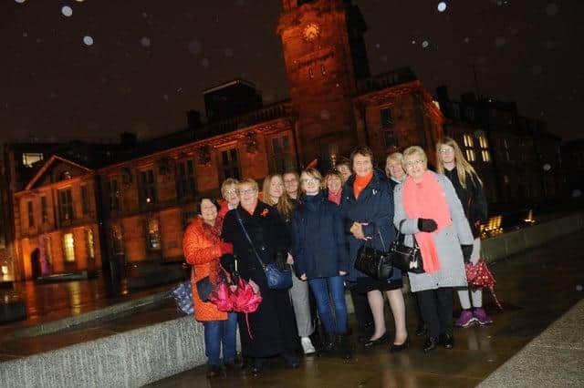 Sunderland Soroptimists pictured in 2019 when landmarks were lit orange to promote the elimination of violence against women.
