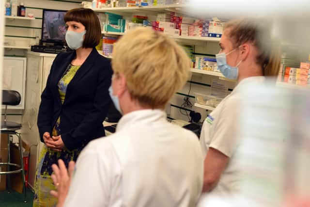 Bridget Phillipson MP, met staff at Whitfield's Pharmacy. Picture by Stu Norton.