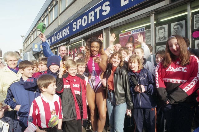 A picture from 1998 as Gladiators star Rocket visited the sports shop. TY McGurk's was a favourite for Castor Graham, Neil Hildreth and Tery Hall Reineck.
.