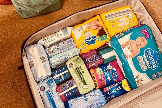 The suitcases were full of toiletries and supplies such as nappies and baby food.