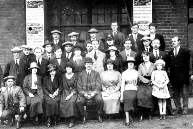 Staff outside the Grand Electric (plus policeman) in about 1920.