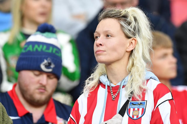 A Sunderland fan watches the action at the Stadium of Light