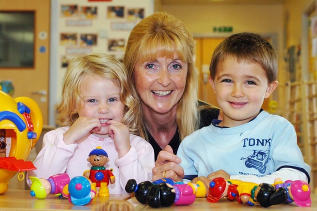 Kay Cummings was the child care manager at the school's new Childrens Centre 16 years ago and here she is with Abby Forster and Samuel Bosworth.
