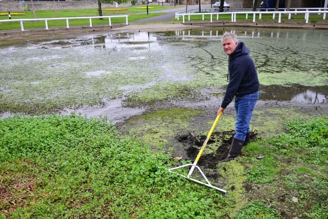 Rolls-Royce engineer Gary Johnston, 52, has spent his time on furlough clearing silt and mud from Whitburn Village pond. 

Picture by FRANK REID