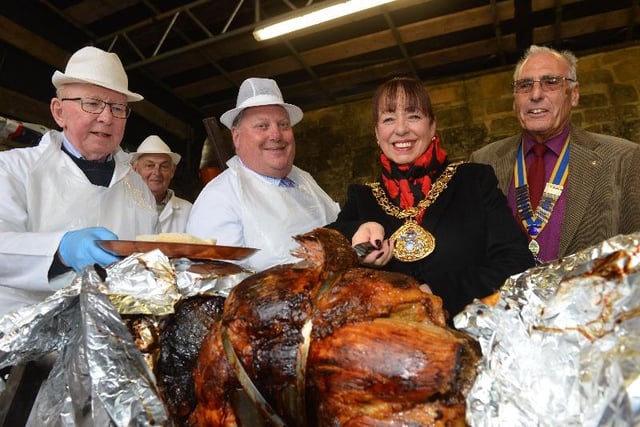 A 2018 view of the Houghton-le-Spring traditional roasting of the ox with the Houghton Rotary Club. From left Ashley Burland, Derek Moss, Mayor of Sunderland Lynda Scanlan and president Graham McGrath.
The tradition pays tribute to Bernard Gilpin the rector of Houghton-le-Spring in the 1580s, who roasted an ox each Sunday to feed the poor.