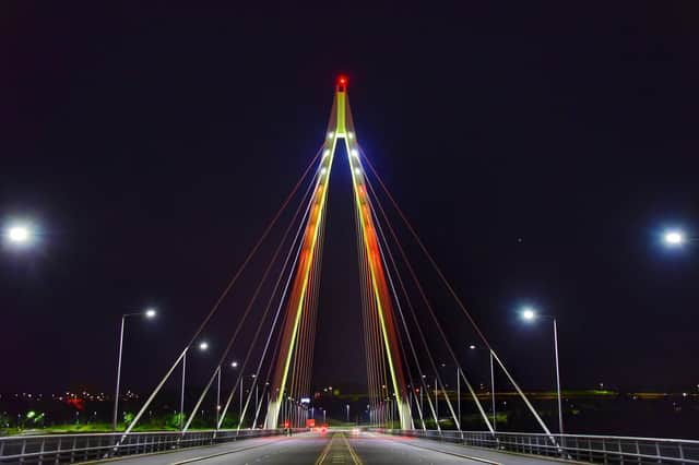 Pictured is The Northern Spire Bridge over the River Wear   in Sunderland which has been  lit red, white and green in a symbolic show of support for the people of Lebanon following Tuesday's huge explosion in Beirut.