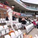 Durham bowler Chris Rushworth makes his way down the pavilion steps to the pitch past spectators for the first time at the Riverside this season before day one of the LV= Insurance County Championship match between Durham and Essex at Emirates Riverside.