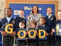 St Leonard's Catholic Primary School headteacher, Dionne Dunn, celebrating the school's good Ofsted inspection with the children.