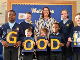 St Leonard's Catholic Primary School headteacher, Dionne Dunn, celebrating the school's good Ofsted inspection with the children.