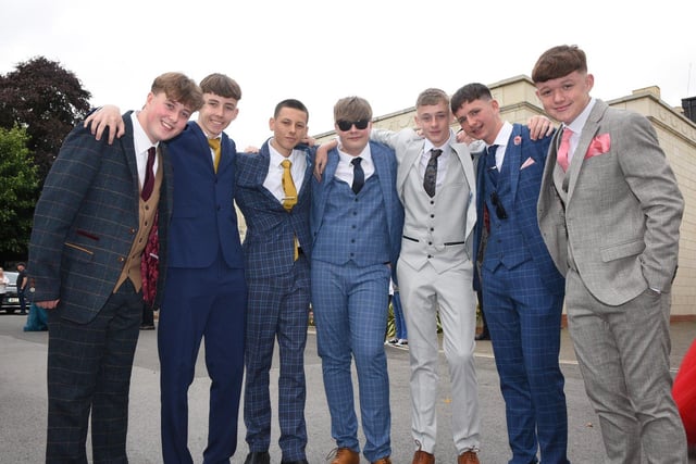 Year 11 boys in a range of stylish three piece suits.