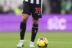 STC advertising board in the background at St James's Park during Newcastle United's 1-0 win over Chelsea in November as Bruno Guimaraes watches on (photo: Getty)