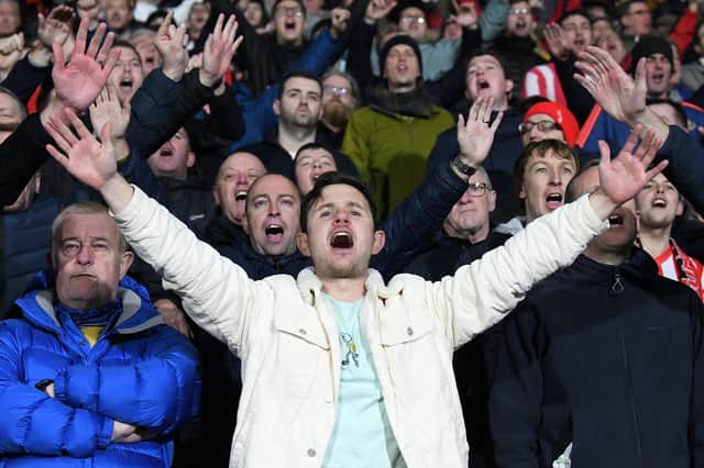 Sunderland fans in action away to Huddersfield Town at the John Smith's Stadium where goals from former Terrier Alex Pritchard and Manchester loanee Amad Diallo handed the Black Cats the win in the Championship.