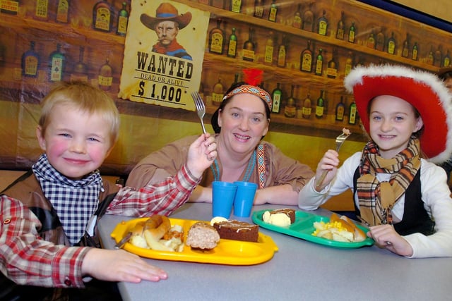 A dinner with a Wild West theme at the school 14 years ago and it looks like Connor Williams and Charli Smillie were enjoying the day. Also pictured is catering supervisor Jillian Jenner.