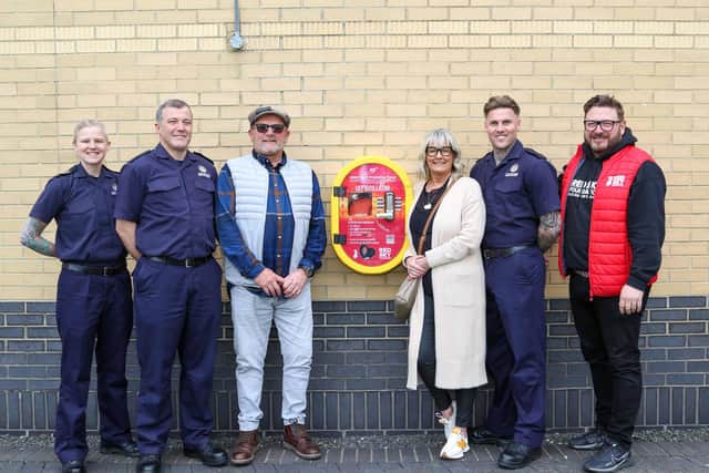 (from left) firefighter Dave Cullen, station manager Jade Makarski, Grant wright, Lynne Wright, firefighter Glen Hargrave and Sergio Petrucci