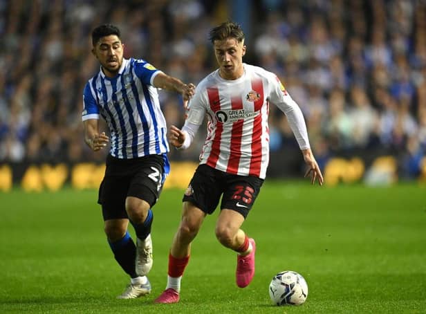 Jack Clarke of Sunderland is challenged by Massimo Luongo of Sheffield Wednesday. (Photo by Michael Regan/Getty Images).