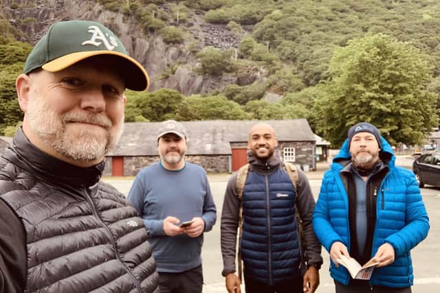 Chris (left) with Ash Davies, Simon Forster and Chris Bellfield ahead of climbing Snowdon in Wales.