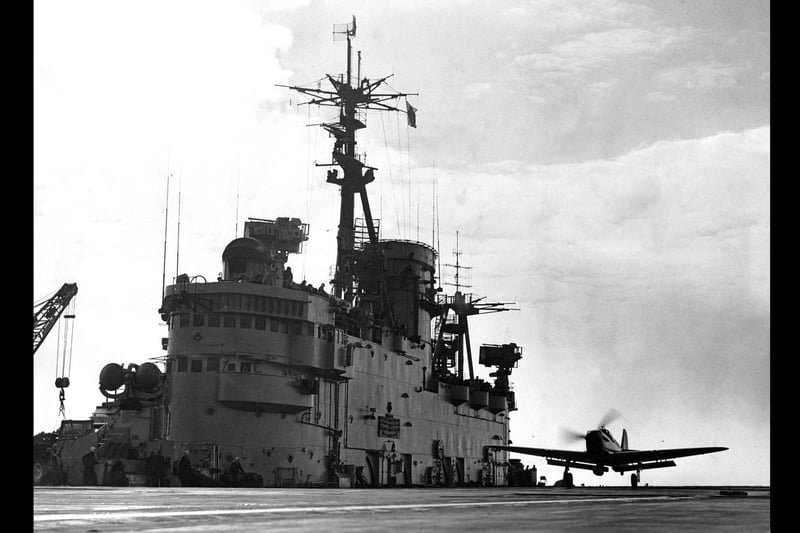A Fairey Firefly carrier-borne fighter and anti-submarine aircraft  landing on the flight deck of the Royal Navy Audacious-class fleet aircraft carrier HMS Eagle during exercises in the English Channel on 19 March 1952 off the English coast near Portsmouth, United Kingdom.  (Photo by Douglas Miller/Keystone/Hulton Archive/Getty Images).