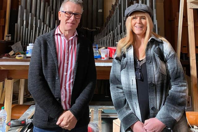 David Jenkins with Tracey Mienie from the Churches Conservation Trust in the west gallery where the main section of the Sunderland organ is being built.