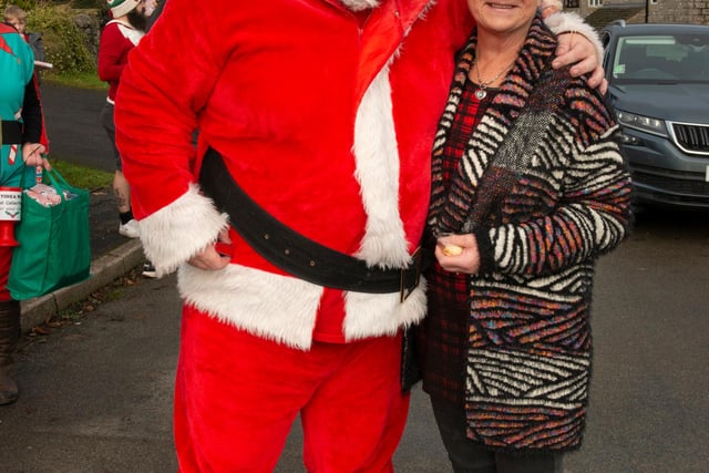 Santa with Cath Dalton, a keen supporter of Tideswell Wakes
