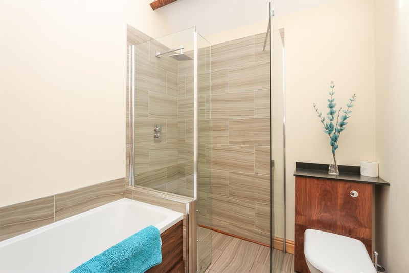 With walk-in shower.