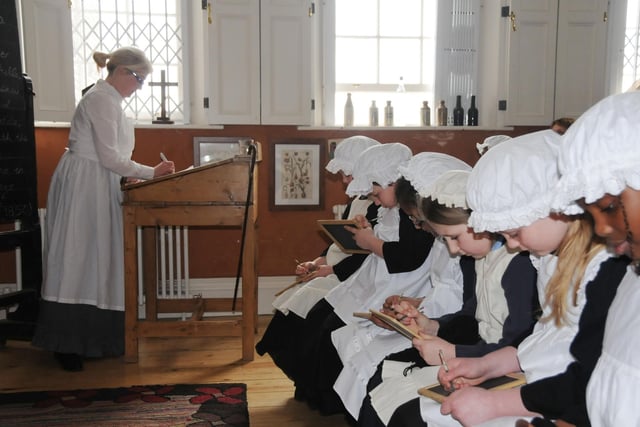 Year 4 pupils from Valley Road Primary School took part in a serious Victorian school lesson,  under the watchful eye of teacher Sharon Vincent at the Donnison School in 2012.